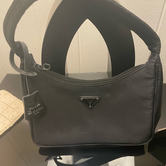 Prada it’s small it’s black - Picture 3 of 5